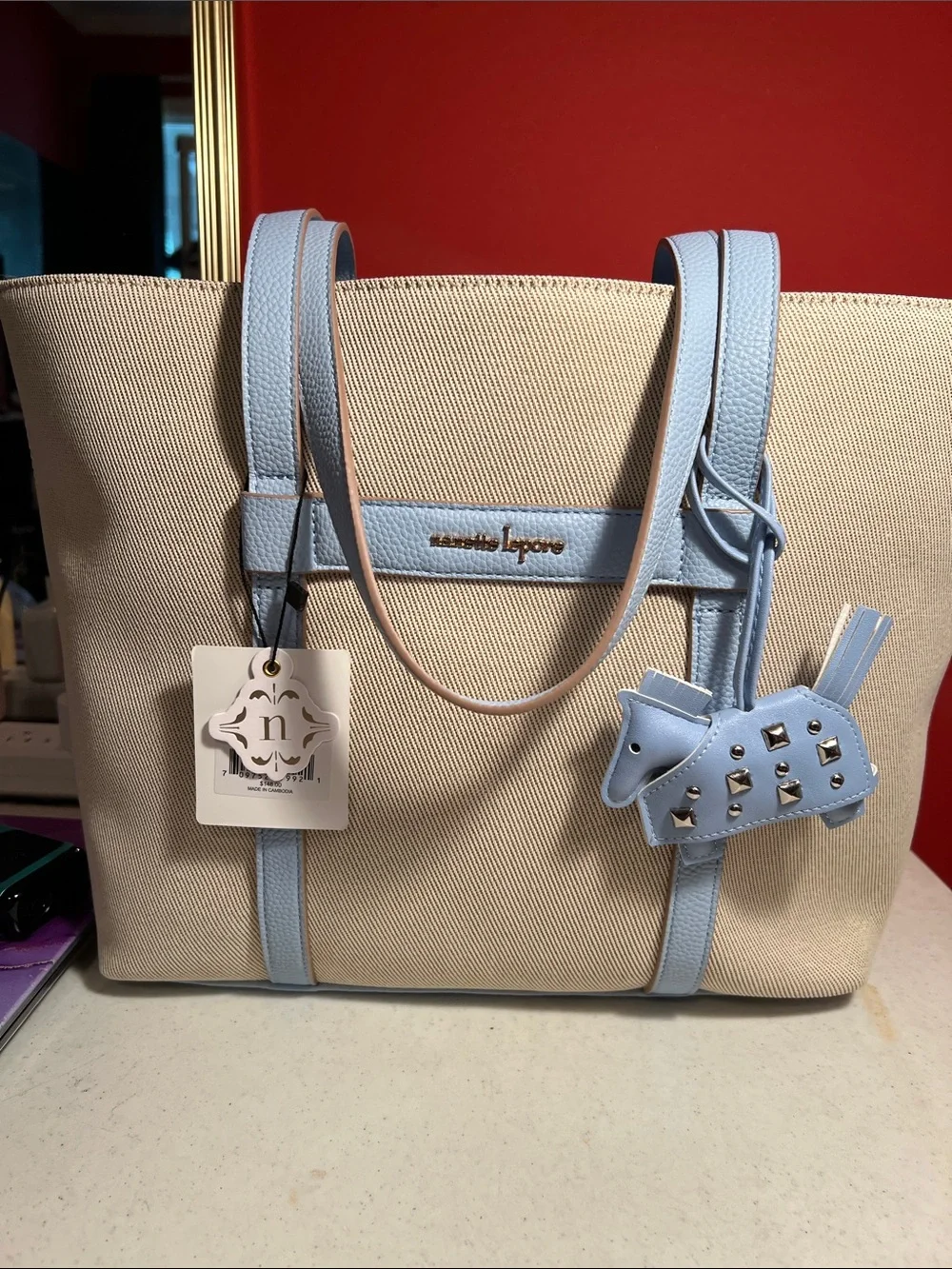 Nanette Lepore Beige Canvas Tote with Light Blue Leather Trim and Charm  RT,148